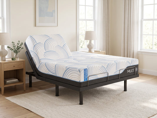 WellFlex ICE Split Head King mattress on an MS300 adjustable base, with one head section raised and the other flat in a bright bedroom.