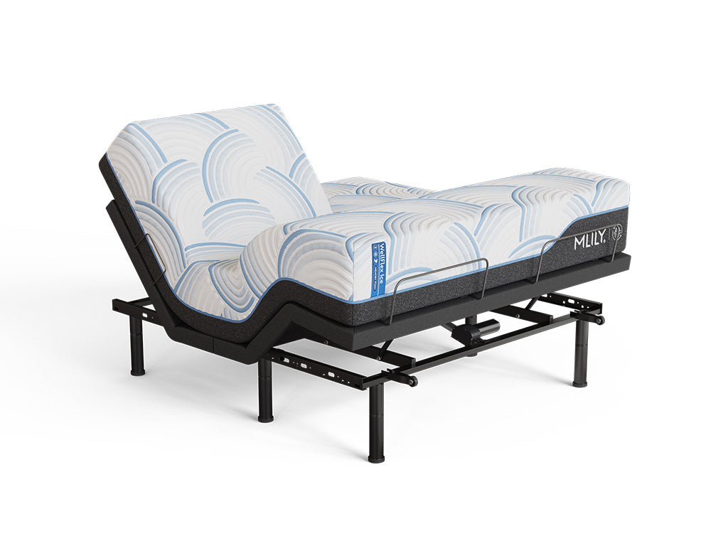 Angled view of the WellFlex ICE Split Head King mattress on an MS300 adjustable base with one head section and the foot section elevated.