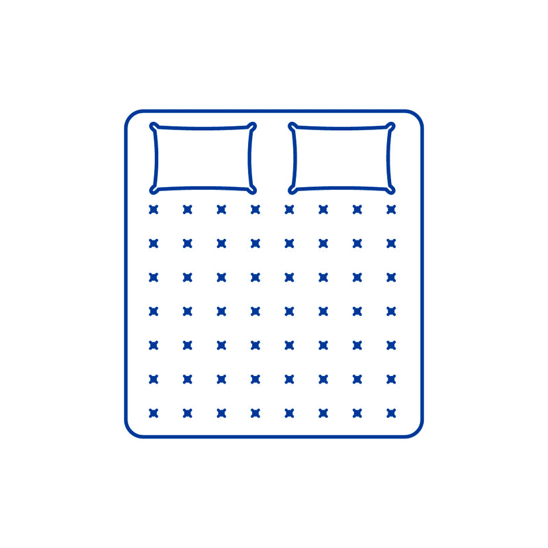 Outline of a bed with blue polka dot pattern and two pillows on a white background