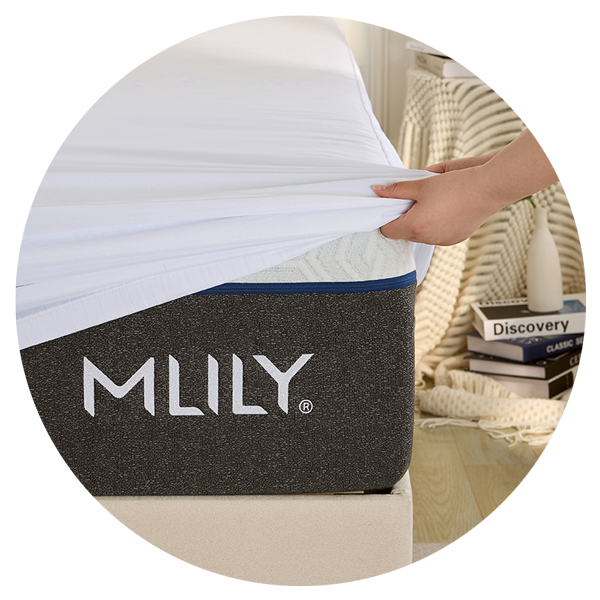 MLILY mattress topper being held by a hand with a blurred background
